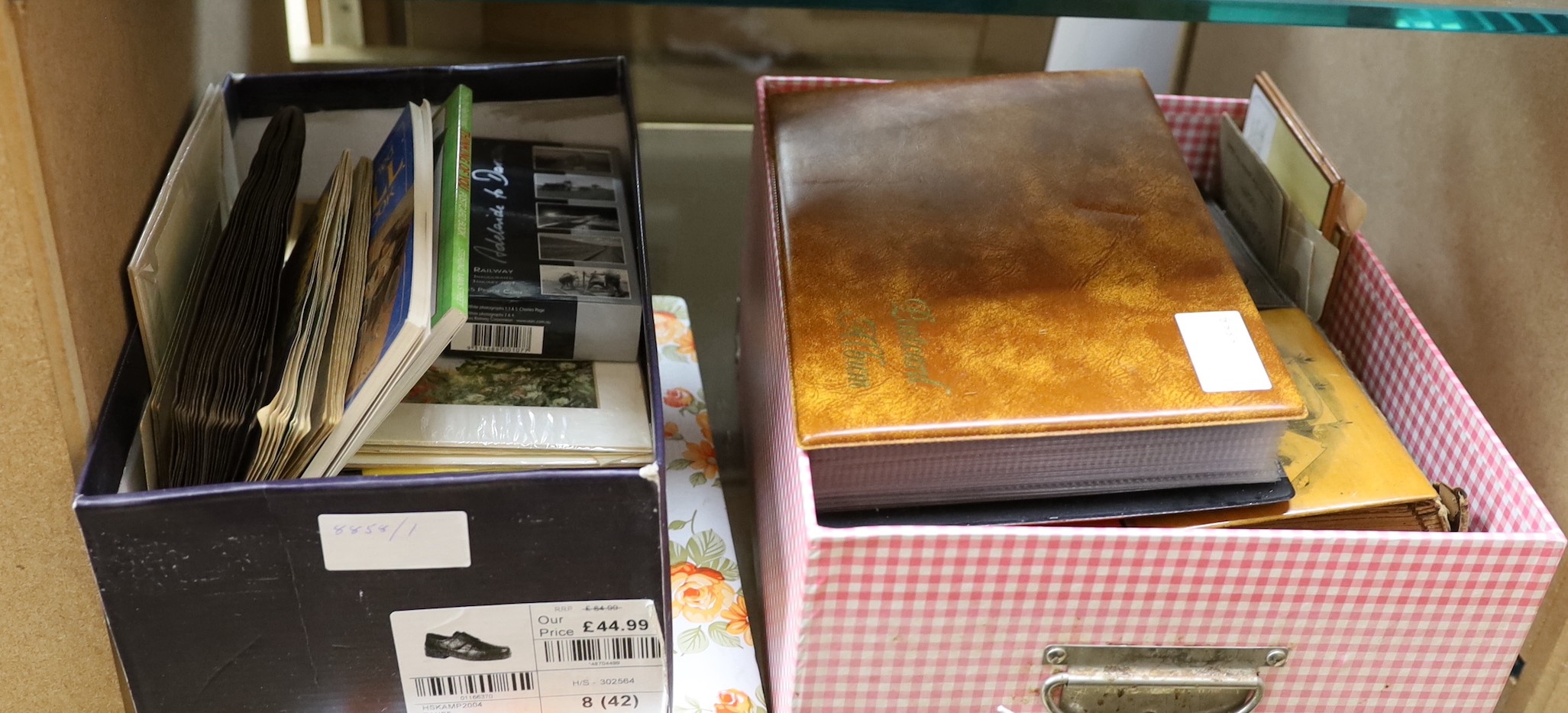 A quantity of cigarette and postcards